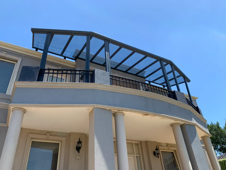 Clearview roof coordinated with an upper-level curved facade