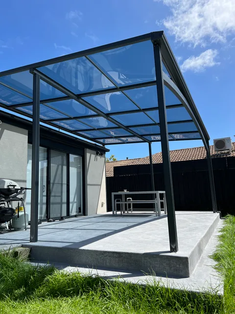 Clearview installation: A clear roof over a paved patio