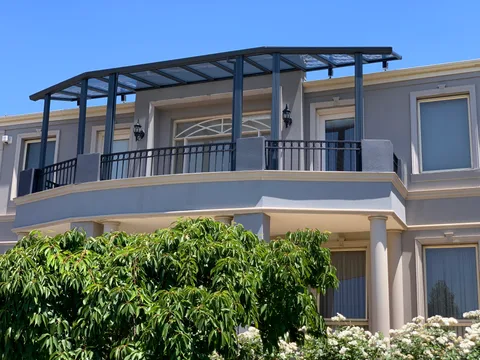 Clearview installation: Roofing along a curved balcony