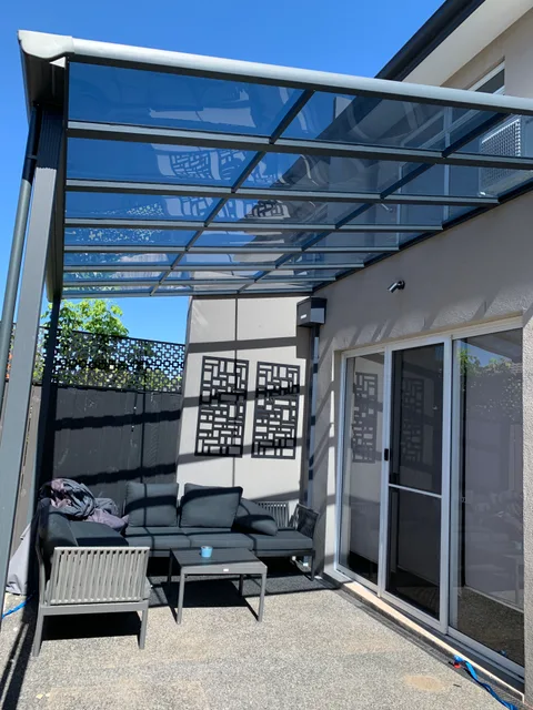 Clearview installation: An outdoor lounge beneath a clear roof