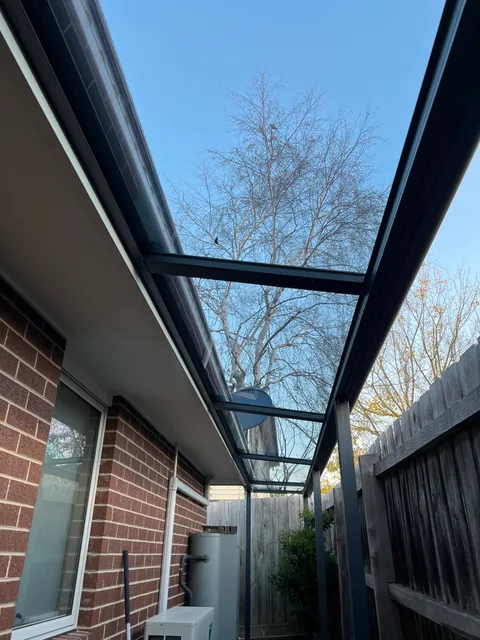 Clearview installation: A narrow side passage beside the home