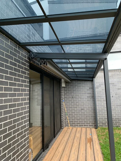 Clearview installation: Covered walkway over timber decking