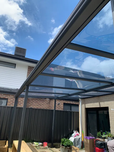 Clearview installation: Sky reflections between roof beams